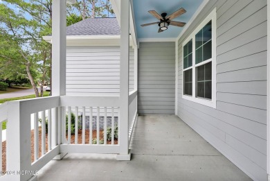 Welcome to your coastal haven, nestled among ancient oaks along on Lockwood Folly Country Club in North Carolina - for sale on GolfHomes.com, golf home, golf lot