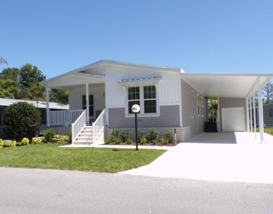 Here is one of our newest, 3 bedroom, lovely 2024 Skyline Home on Schalamar Creek Golf and Country Club in Florida - for sale on GolfHomes.com, golf home, golf lot