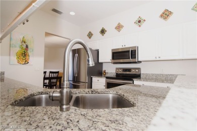 Have you been waiting for the PERFECT TURNKEY Carriage Home at on Colonial Country Club in Florida - for sale on GolfHomes.com, golf home, golf lot