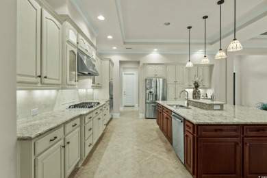 Experience luxury living at its finest at 9590 Bellasera Circle on The Members Club At Grande Dunes in South Carolina - for sale on GolfHomes.com, golf home, golf lot