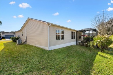 Looking for a cozy, move-in-ready home with updates galore? Look on Truman Executive Golf Course in Florida - for sale on GolfHomes.com, golf home, golf lot