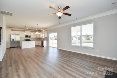 Welcome home to this move in ready 4-bedroom, 2.5-bath residence on Westport Golf Club in North Carolina - for sale on GolfHomes.com, golf home, golf lot