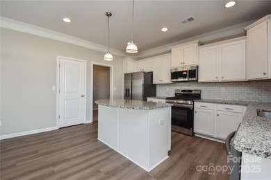 Welcome home to this move in ready 4-bedroom, 2.5-bath residence on Westport Golf Club in North Carolina - for sale on GolfHomes.com, golf home, golf lot