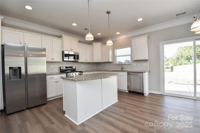 Welcome home to this move in ready 4-bedroom, 2.5-bath residence on Westport Golf Club in North Carolina - for sale on GolfHomes.com, golf home, golf lot