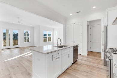 This Bella XL plan, with an alternate elevation, has 3 bedrooms on Origins Golf Club in Florida - for sale on GolfHomes.com, golf home, golf lot