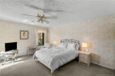 Don't miss this 2-bed, 2-bath condominium in the private on Miles Grant Country Club in Florida - for sale on GolfHomes.com, golf home, golf lot