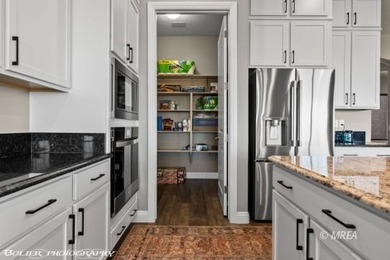 Experience unparalleled luxury in this 2,810 sq ft masterpiece on Conestoga Golf Club in Nevada - for sale on GolfHomes.com, golf home, golf lot