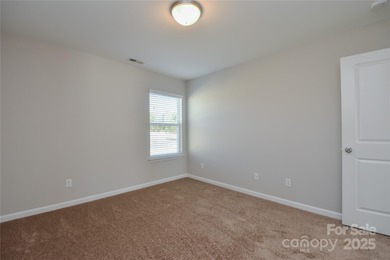 Welcome home to this move in ready 4-bedroom, 2.5-bath residence on Westport Golf Club in North Carolina - for sale on GolfHomes.com, golf home, golf lot