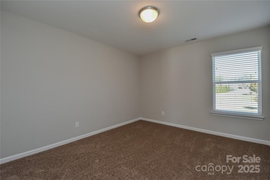 Welcome home to this move in ready 4-bedroom, 2.5-bath residence on Westport Golf Club in North Carolina - for sale on GolfHomes.com, golf home, golf lot