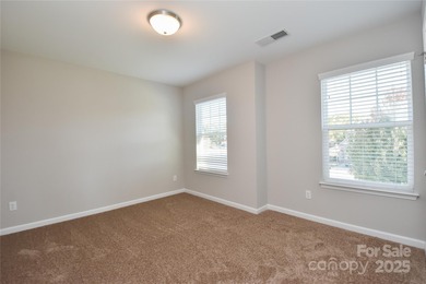 Welcome home to this move in ready 4-bedroom, 2.5-bath residence on Westport Golf Club in North Carolina - for sale on GolfHomes.com, golf home, golf lot