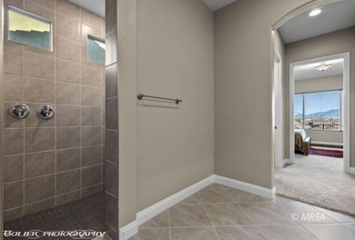 Experience unparalleled luxury in this 2,810 sq ft masterpiece on Conestoga Golf Club in Nevada - for sale on GolfHomes.com, golf home, golf lot