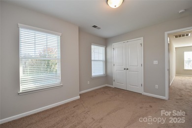 Welcome home to this move in ready 4-bedroom, 2.5-bath residence on Westport Golf Club in North Carolina - for sale on GolfHomes.com, golf home, golf lot