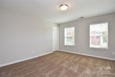 Welcome home to this move in ready 4-bedroom, 2.5-bath residence on Westport Golf Club in North Carolina - for sale on GolfHomes.com, golf home, golf lot