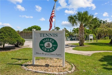 Don't miss this 2-bed, 2-bath condominium in the private on Miles Grant Country Club in Florida - for sale on GolfHomes.com, golf home, golf lot