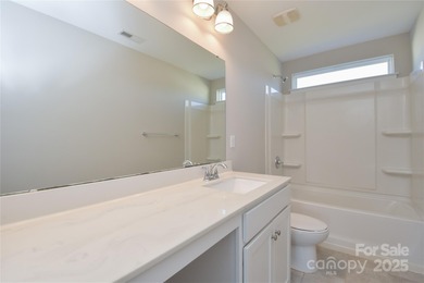 Welcome home to this move in ready 4-bedroom, 2.5-bath residence on Westport Golf Club in North Carolina - for sale on GolfHomes.com, golf home, golf lot