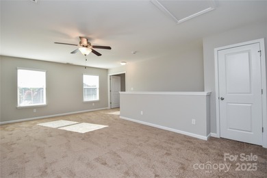 Welcome home to this move in ready 4-bedroom, 2.5-bath residence on Westport Golf Club in North Carolina - for sale on GolfHomes.com, golf home, golf lot