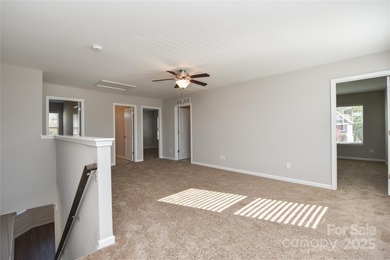 Welcome home to this move in ready 4-bedroom, 2.5-bath residence on Westport Golf Club in North Carolina - for sale on GolfHomes.com, golf home, golf lot