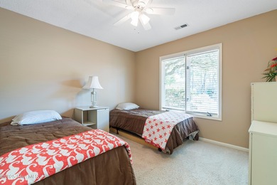 Just off the main road & nestled in the Sugar Sands section of on Sea Trail Golf Resort in North Carolina - for sale on GolfHomes.com, golf home, golf lot