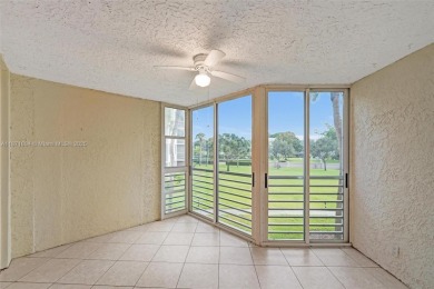 Spacious and bright 3-bedroom corner unit located on the second on Pine Island Ridge Country Club in Florida - for sale on GolfHomes.com, golf home, golf lot