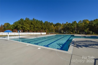 Welcome home to this move in ready 4-bedroom, 2.5-bath residence on Westport Golf Club in North Carolina - for sale on GolfHomes.com, golf home, golf lot