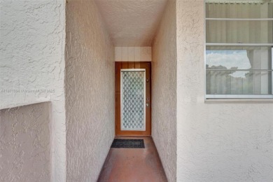 Spacious and bright 3-bedroom corner unit located on the second on Pine Island Ridge Country Club in Florida - for sale on GolfHomes.com, golf home, golf lot