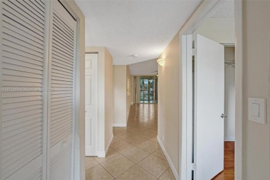 Spacious and bright 3-bedroom corner unit located on the second on Pine Island Ridge Country Club in Florida - for sale on GolfHomes.com, golf home, golf lot