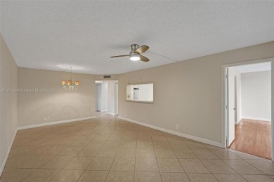 Spacious and bright 3-bedroom corner unit located on the second on Pine Island Ridge Country Club in Florida - for sale on GolfHomes.com, golf home, golf lot