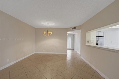 Spacious and bright 3-bedroom corner unit located on the second on Pine Island Ridge Country Club in Florida - for sale on GolfHomes.com, golf home, golf lot