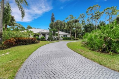 This beautifully redesigned home is nestled on an oversized lot on Imperial Golf Club in Florida - for sale on GolfHomes.com, golf home, golf lot