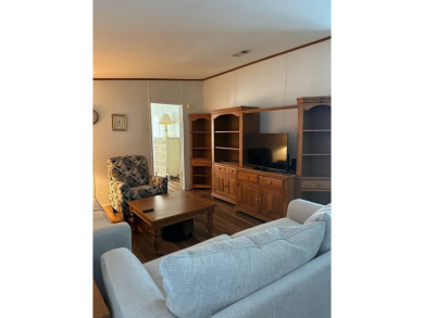 Discover this charming and well-maintained 3-bedroom home on Schalamar Creek Golf and Country Club in Florida - for sale on GolfHomes.com, golf home, golf lot
