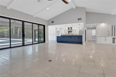 This beautifully redesigned home is nestled on an oversized lot on Imperial Golf Club in Florida - for sale on GolfHomes.com, golf home, golf lot