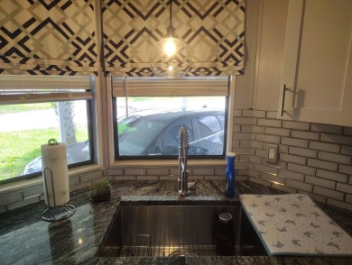 Welcome Home!! This 2-bedroom / 2-bath updated home is waiting on Spanish Lakes Fairways in Florida - for sale on GolfHomes.com, golf home, golf lot