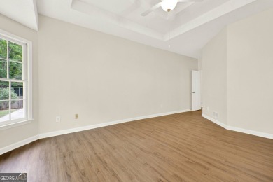 Welcome to this beautifully updated 3-bedroom, 2-bath stepless on Canongate At Eagle Watch Golf Club in Georgia - for sale on GolfHomes.com, golf home, golf lot