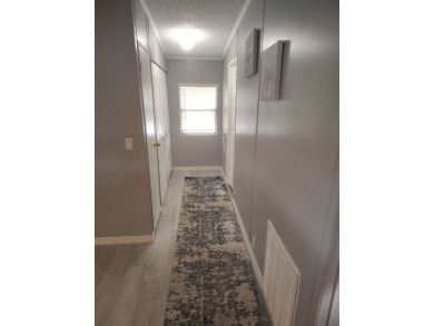 Welcome Home!! This 2-bedroom / 2-bath updated home is waiting on Spanish Lakes Fairways in Florida - for sale on GolfHomes.com, golf home, golf lot