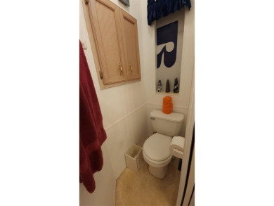 PET FRIENDLY, SINGLE WIDE MOBILE HOME IN ACTIVE 55+ COMMUNITY! on River Run Golf Links in Florida - for sale on GolfHomes.com, golf home, golf lot