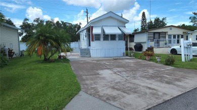 PET FRIENDLY, SINGLE WIDE MOBILE HOME IN ACTIVE 55+ COMMUNITY! on River Run Golf Links in Florida - for sale on GolfHomes.com, golf home, golf lot