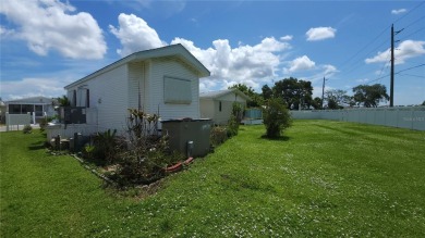 PET FRIENDLY, SINGLE WIDE MOBILE HOME IN ACTIVE 55+ COMMUNITY! on River Run Golf Links in Florida - for sale on GolfHomes.com, golf home, golf lot