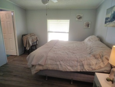 Welcome Home!! This 2-bedroom / 2-bath updated home is waiting on Spanish Lakes Fairways in Florida - for sale on GolfHomes.com, golf home, golf lot