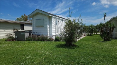 PET FRIENDLY, SINGLE WIDE MOBILE HOME IN ACTIVE 55+ COMMUNITY! on River Run Golf Links in Florida - for sale on GolfHomes.com, golf home, golf lot