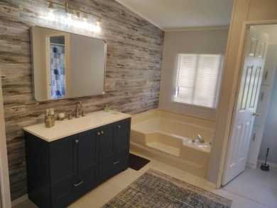 Welcome Home!! This 2-bedroom / 2-bath updated home is waiting on Spanish Lakes Fairways in Florida - for sale on GolfHomes.com, golf home, golf lot