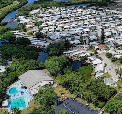 PET FRIENDLY, SINGLE WIDE MOBILE HOME IN ACTIVE 55+ COMMUNITY! on River Run Golf Links in Florida - for sale on GolfHomes.com, golf home, golf lot