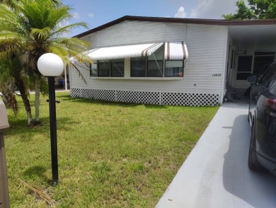 Welcome Home!! This 2-bedroom / 2-bath updated home is waiting on Spanish Lakes Fairways in Florida - for sale on GolfHomes.com, golf home, golf lot
