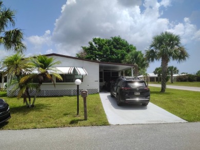 Welcome Home!! This 2-bedroom / 2-bath updated home is waiting on Spanish Lakes Fairways in Florida - for sale on GolfHomes.com, golf home, golf lot