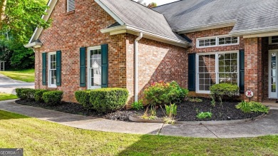Welcome to this beautifully updated 3-bedroom, 2-bath stepless on Canongate At Eagle Watch Golf Club in Georgia - for sale on GolfHomes.com, golf home, golf lot