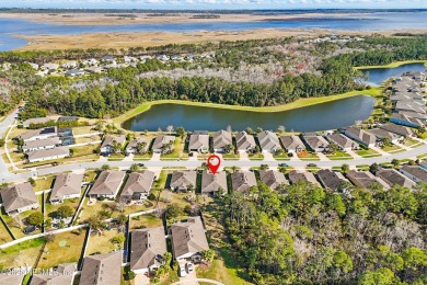 Welcome to this beautifully maintained 4-bedroom, 3-bath home in on The Palencia Club in Florida - for sale on GolfHomes.com, golf home, golf lot