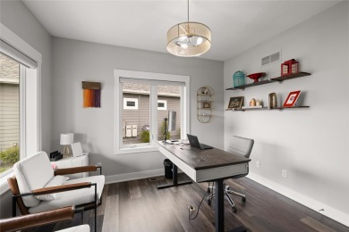 This zero-entry ranch home offers a blend of comfort and modern on Otter Creek Golf Course in Iowa - for sale on GolfHomes.com, golf home, golf lot