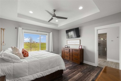 This zero-entry ranch home offers a blend of comfort and modern on Otter Creek Golf Course in Iowa - for sale on GolfHomes.com, golf home, golf lot