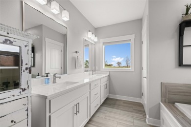 This zero-entry ranch home offers a blend of comfort and modern on Otter Creek Golf Course in Iowa - for sale on GolfHomes.com, golf home, golf lot
