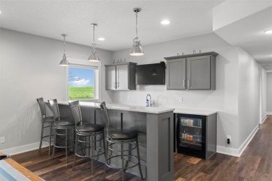 This zero-entry ranch home offers a blend of comfort and modern on Otter Creek Golf Course in Iowa - for sale on GolfHomes.com, golf home, golf lot