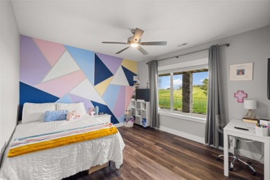 This zero-entry ranch home offers a blend of comfort and modern on Otter Creek Golf Course in Iowa - for sale on GolfHomes.com, golf home, golf lot